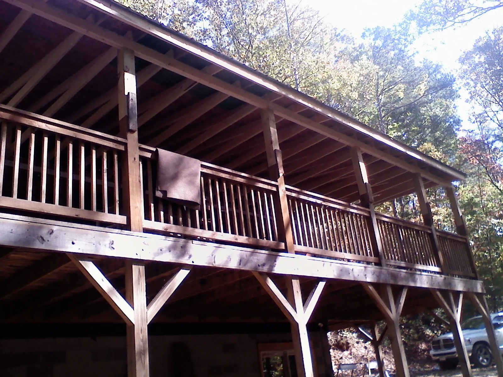 Timber framing under a new elevated porch and deck — Roof Leak Repair in Selma by Roofing Brothers